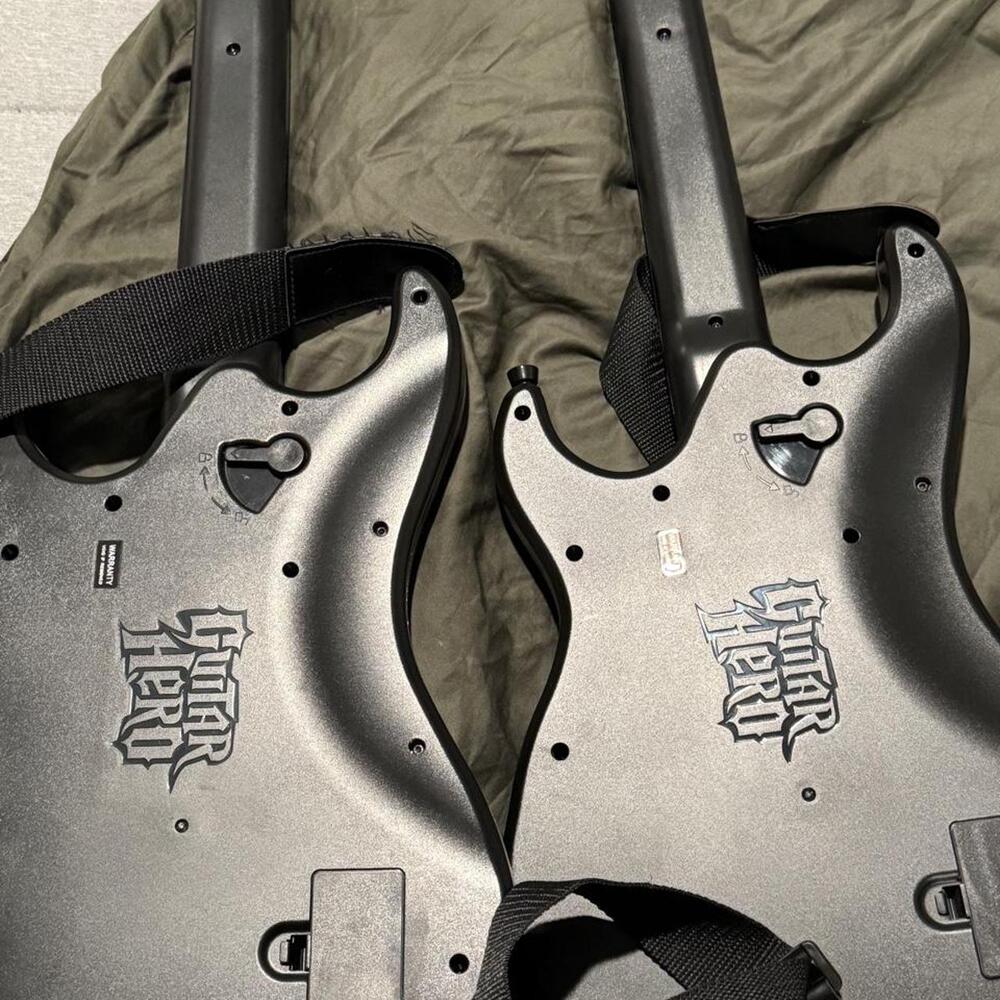 Guitar Hero 5 guitar controllers with colorful lettering on the neck - Picture 4 of 4